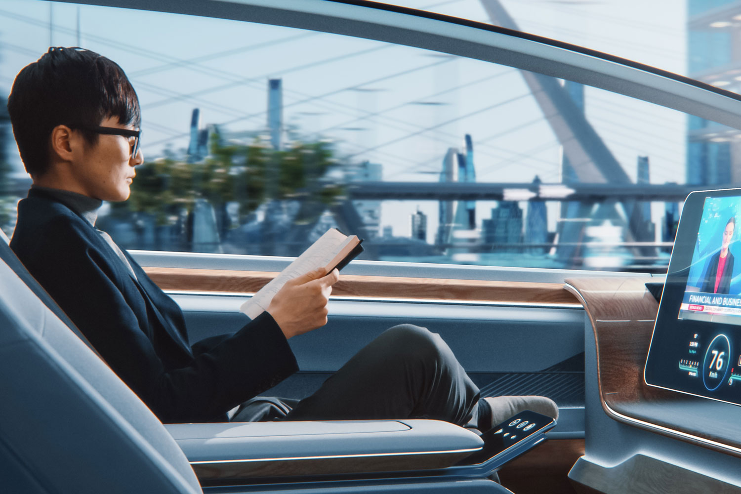 Alt Text: a Man reading a book in a self driving car with a tablet connected to the console with the morning news playing on it 